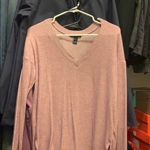 Shirt, almost like a sweater but lighter.